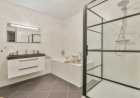 How to Choose Between a Walk-In Shower and a Tub